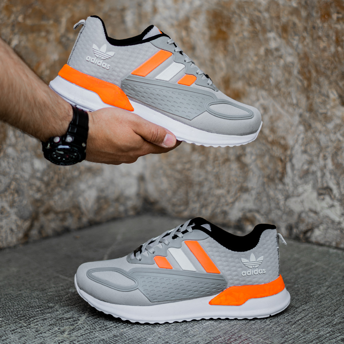 کفش ورزشی Adidas مردانه طوسی نارنجی مدل Tilda